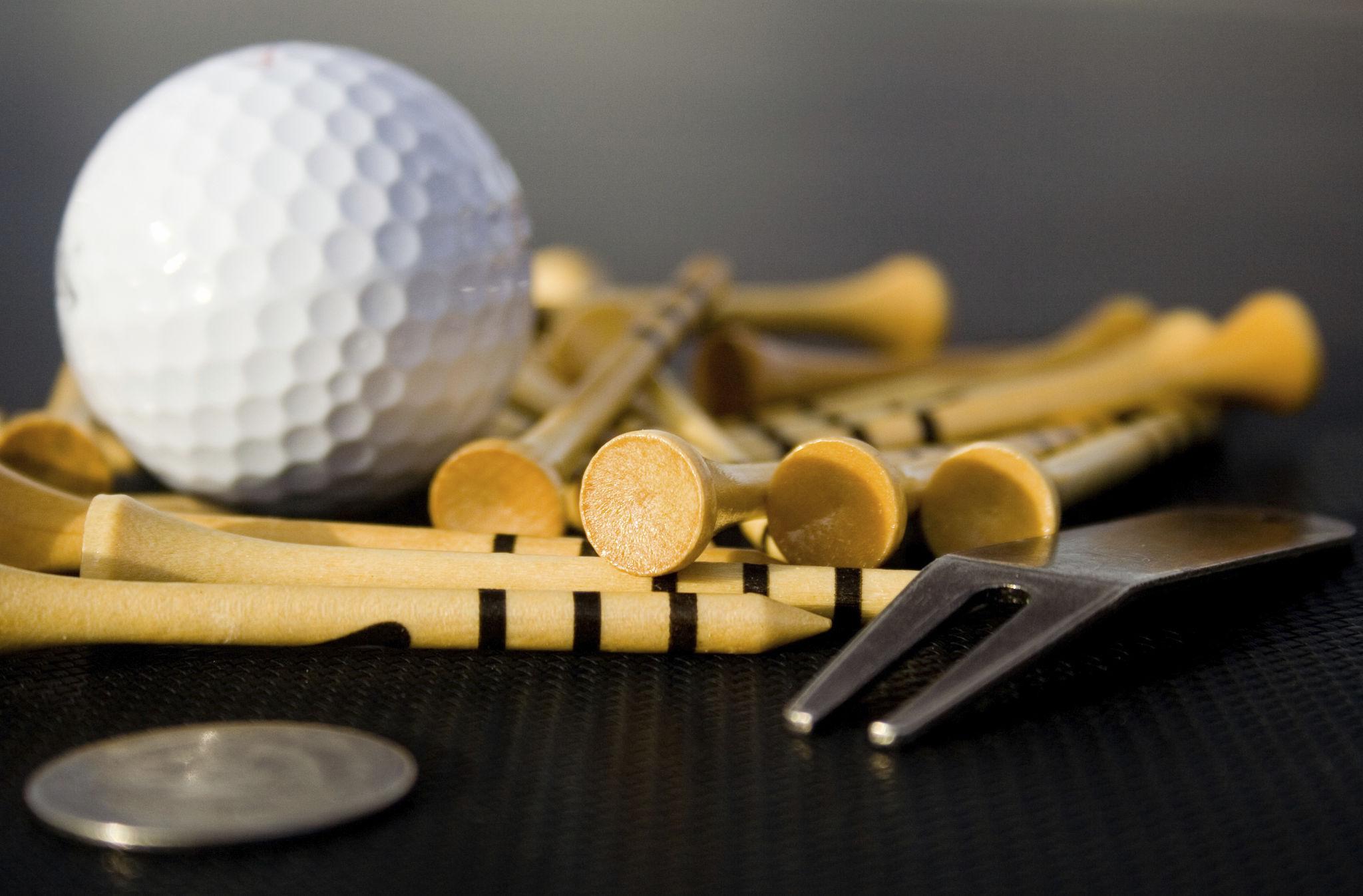 Golf balls, tees, gloves, and bag essentials
